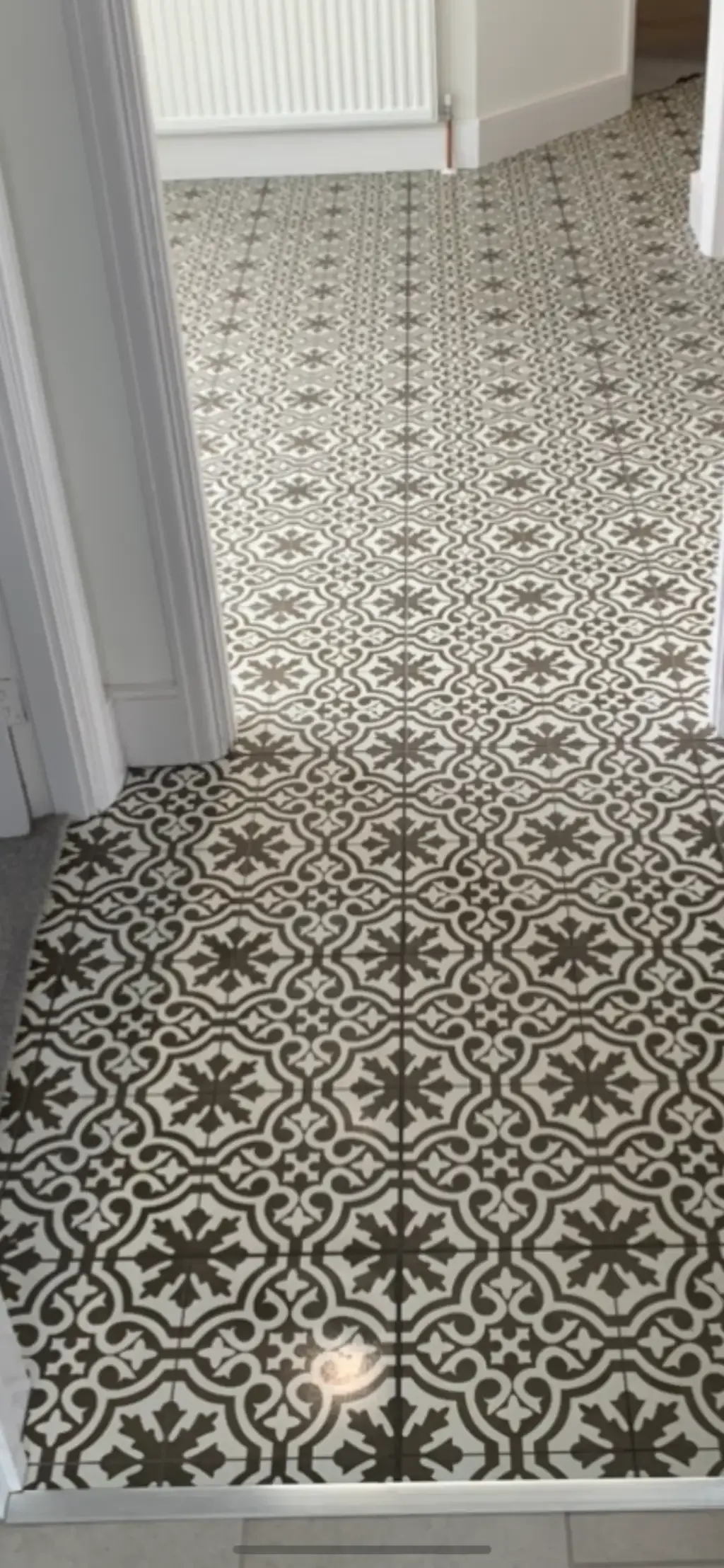 Encaustic-pattern floor by Prestige Tiling