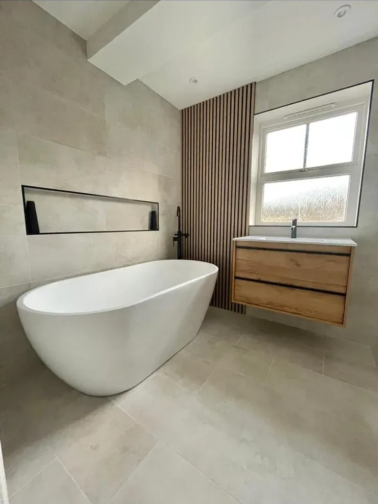 Freestanding bath & vanity by Prestige Tiling