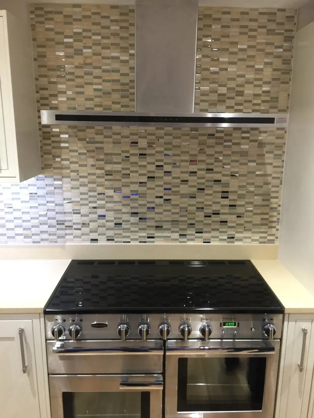 Glass mosaic splashback by Prestige Tiling